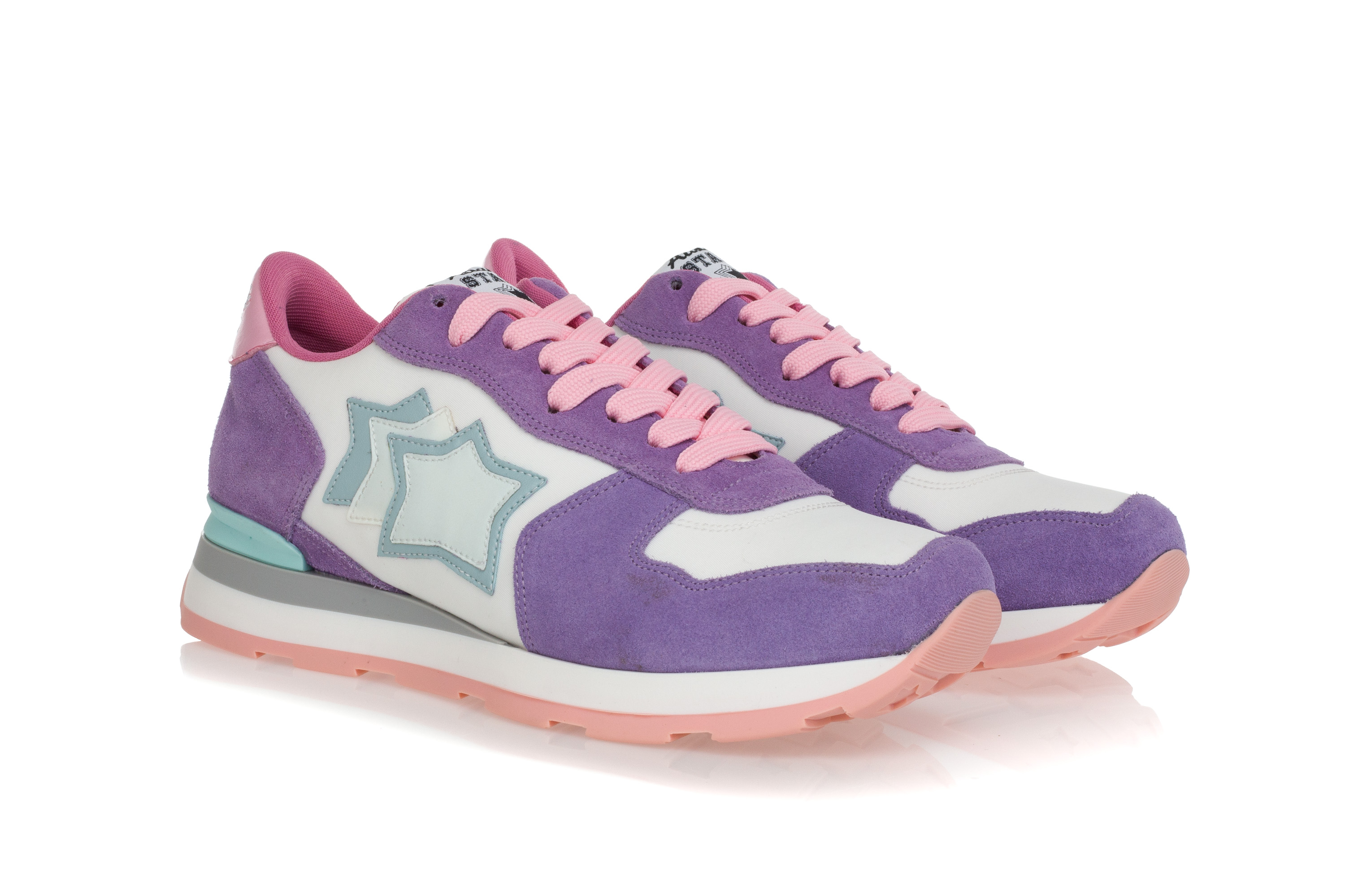 white fabric trainers